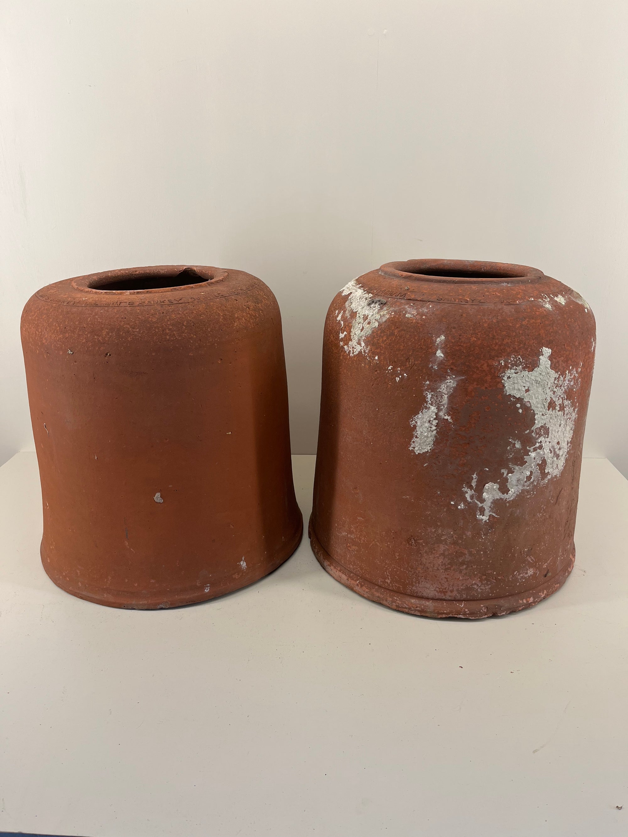 Pair of Sankey Terracotta Forcers