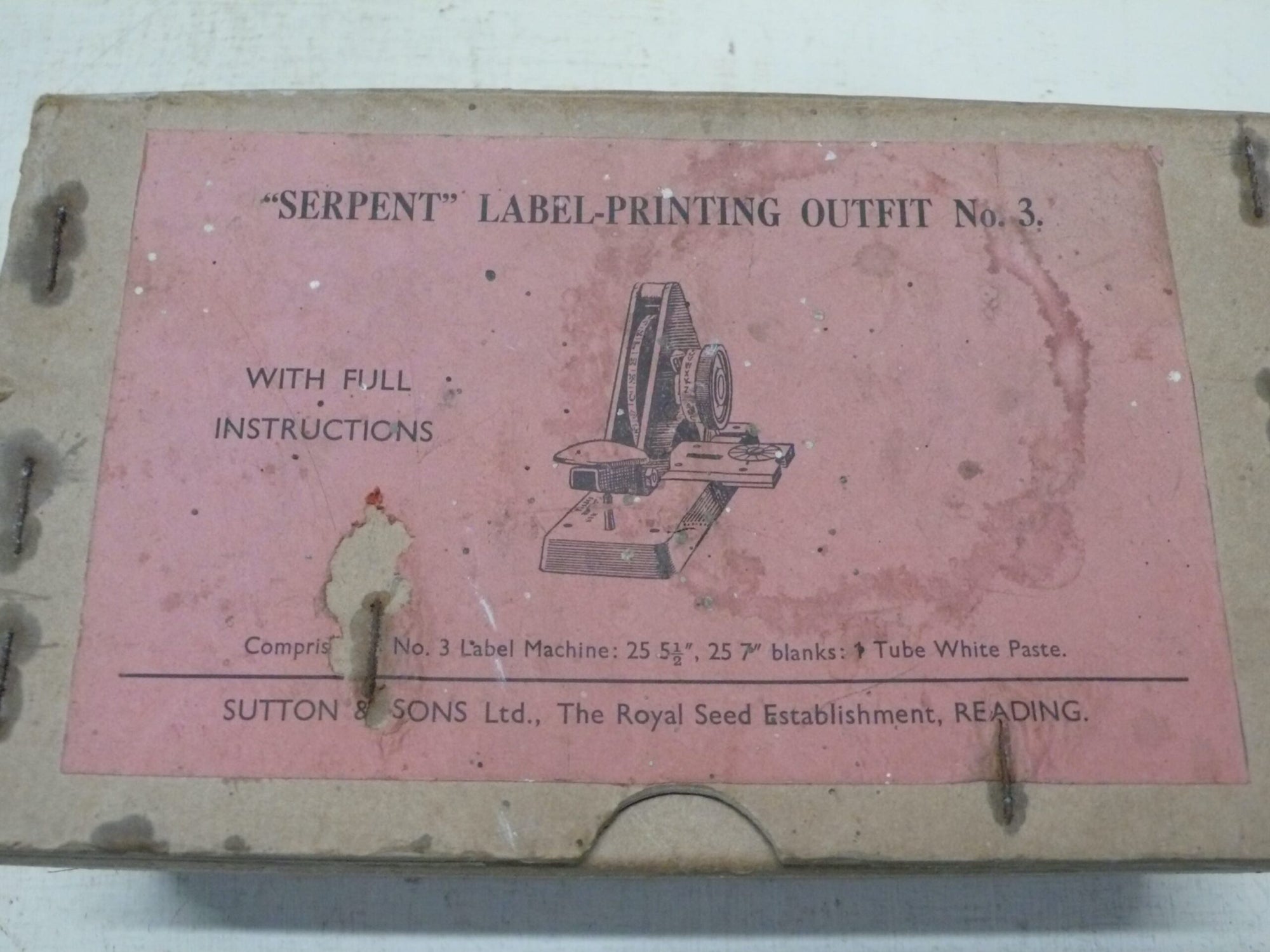 Suttons Serpent Label Machine