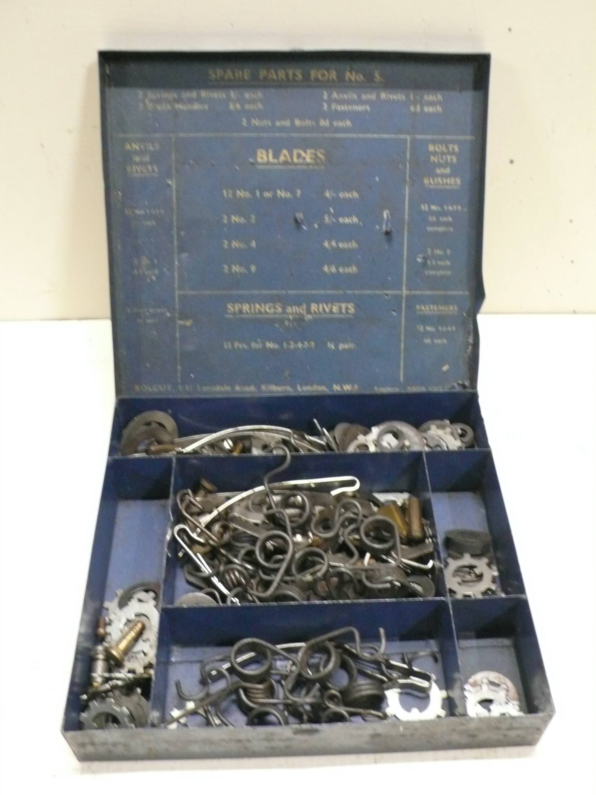 Tin of Rolcut Spare Parts